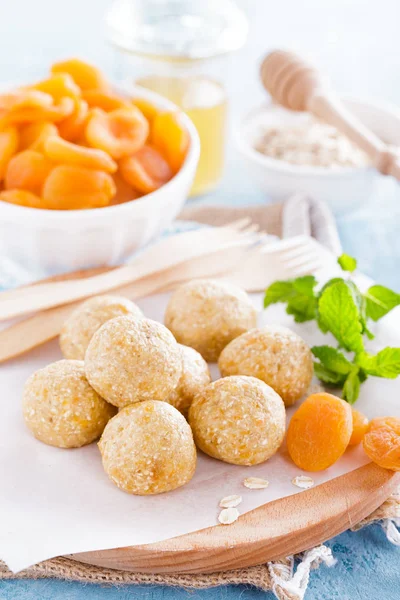 Oat balls with honey, apricot and banana, healthy vegan dessert