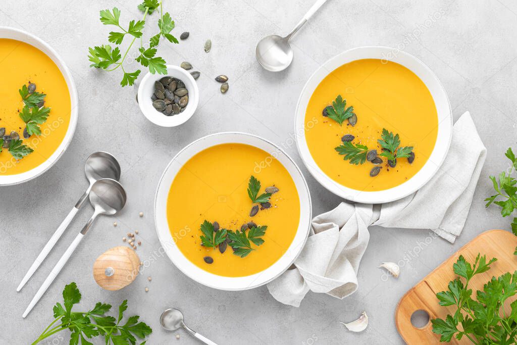 Vegan pumpkin soup with garlic and parsley