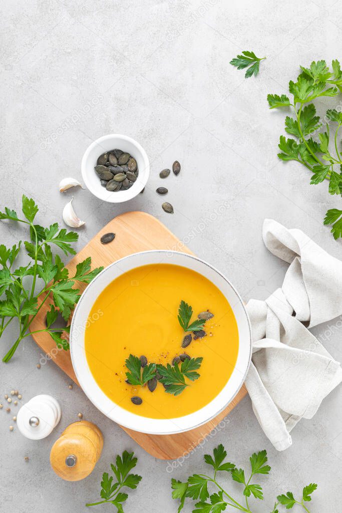 Vegan pumpkin soup with garlic and parsley