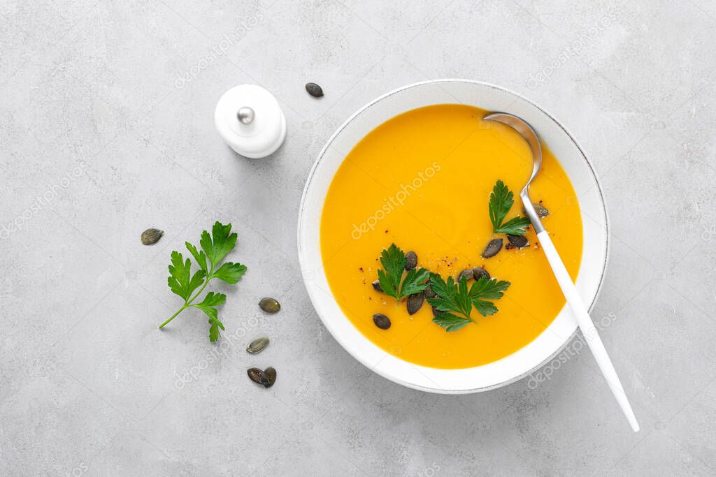 Vegan pumpkin soup with garlic and parsley