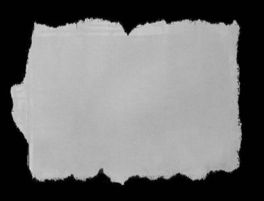 Siyah üzerine yırtık bir kağıt parçası