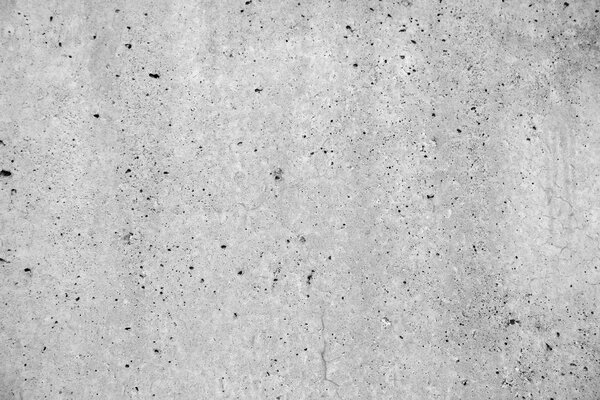 Крупный план текстурированной серой бетонной стены

