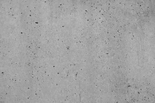 Крупный план текстурированной серой бетонной стены
