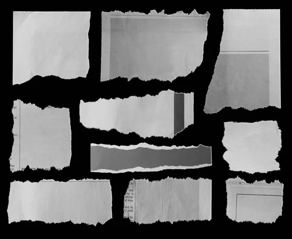 Десять Кусочков Рваной Бумаги Черном — стоковое фото