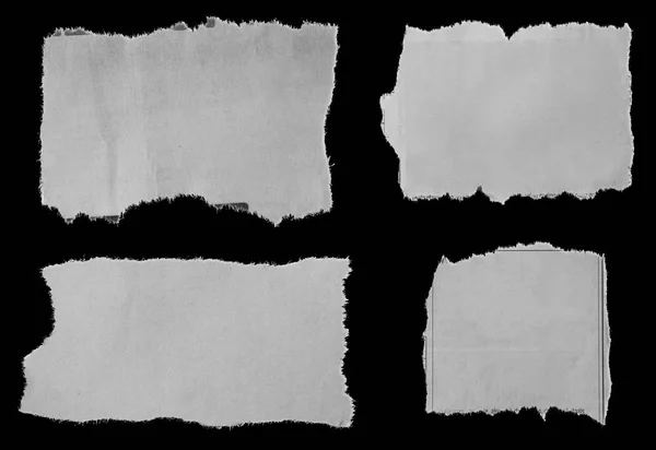 Dört Adet Siyah Yırtık Kağıt — Stok fotoğraf