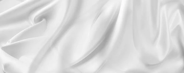 波纹状的白色丝织物的特写 — 图库照片