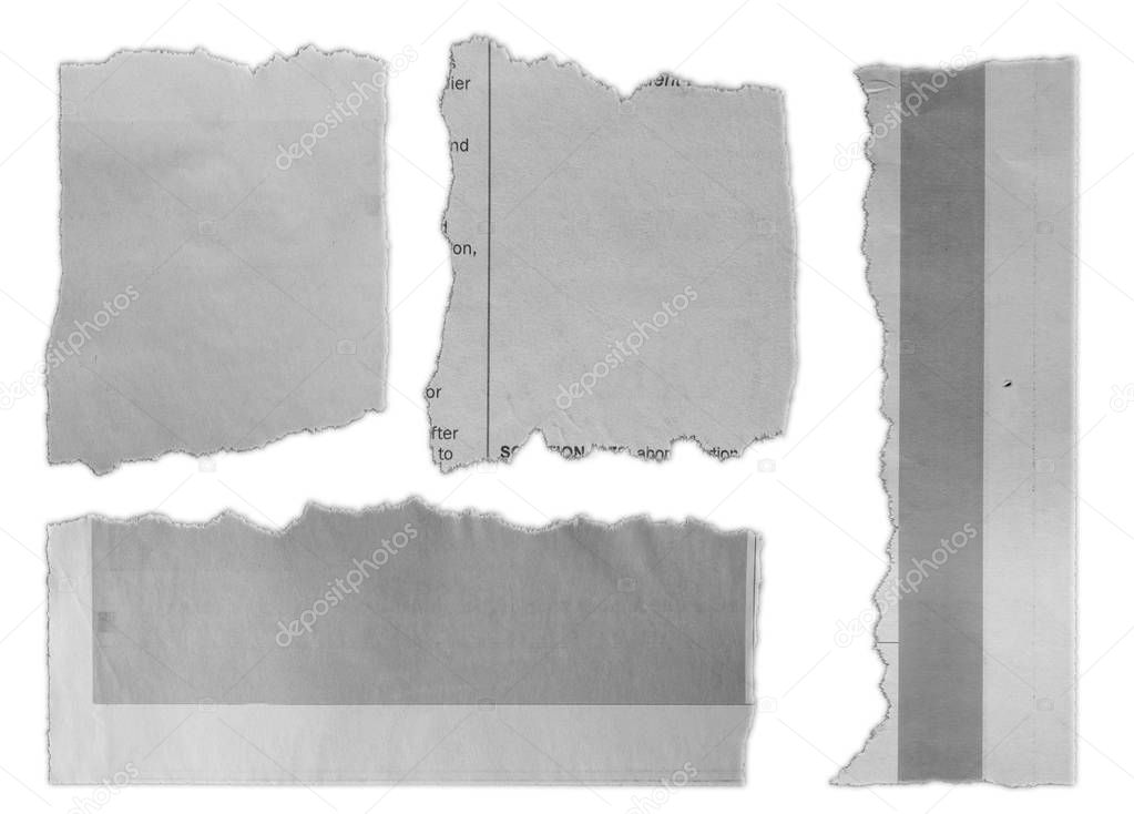 Pieces of torn paper on plain background 
