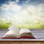 Open Book Table Front Spring Scene Stock Photo by ©stillfx 220040838