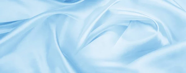 Blauwe zijdeachtige stof textuur — Stockfoto