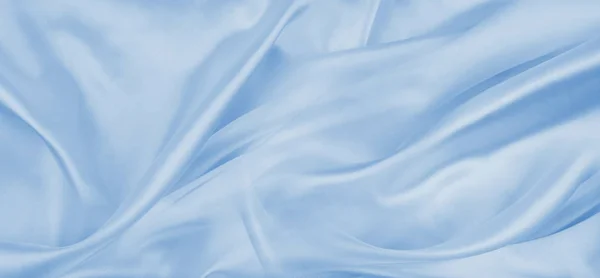 Синя шовковиста текстура тканини — стокове фото