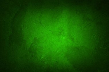 Closeup of green textured wall, dark edge