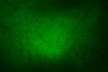 Closeup of green textured wall, dark edge