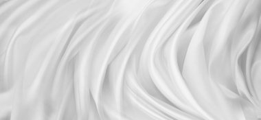 Dalgalanan beyaz ipek kumaş çizgilerinin yakınlaştırılması