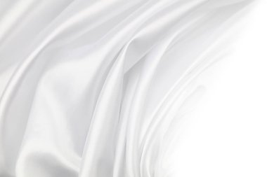 Dalgalanan beyaz ipek kumaş çizgilerinin yakınlaştırılması