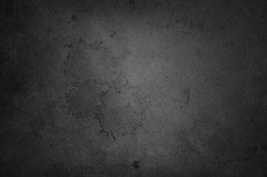 Gri çatlamış betonun yakın plan görüntüsü
