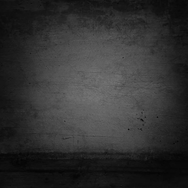 Close-up of grey textured concrete. Dark edge