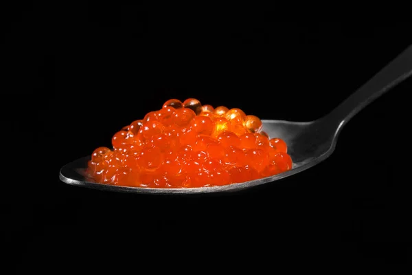 Red caviar in a spoon close-up. — Stock Photo, Image