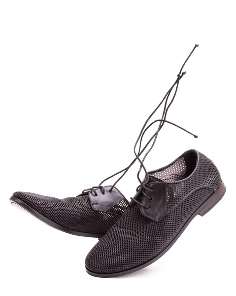 천천이 있는 남성 신발 한 켤레 — 스톡 사진