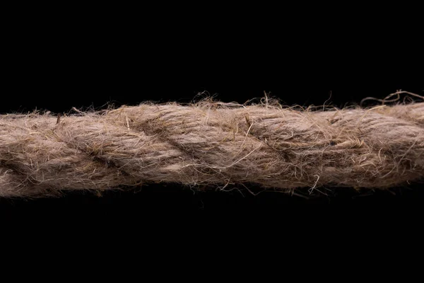 Джутова мотузка на чорному тлі — стокове фото