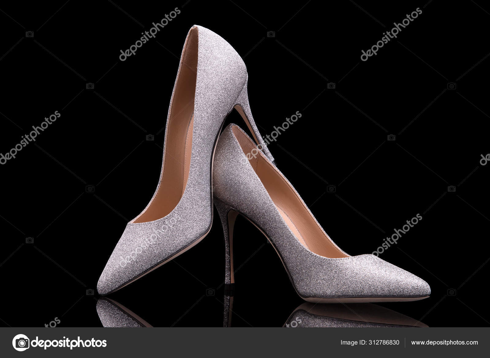 Highheeled shoes made from glittering glitter. Stock Photo by ©forton