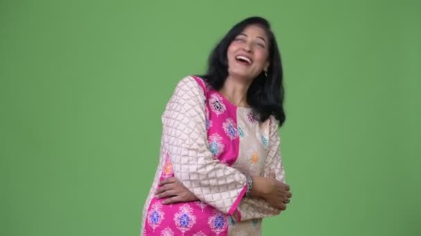 Mature happy beautiful Indian woman laughing — Stock Video