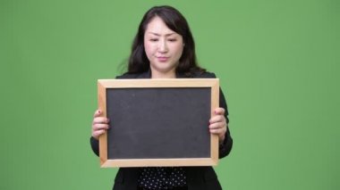 Olgun güzel Asya işkadını seyir blackboard gösterilen süre şok