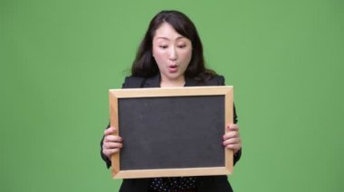 Olgun güzel Asya işkadını seyir blackboard gösterilen süre şok