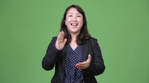 Reifen glücklich asiatische Geschäftsfrau klatschen Hände — Stockvideo