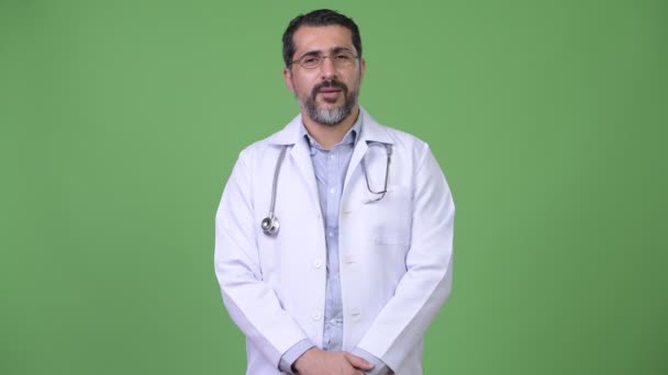 Handsome Persian bearded man doctor greeting — Stock Video