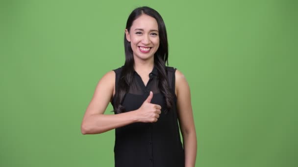 Young beautiful Asian businesswoman giving thumbs up — Stock Video