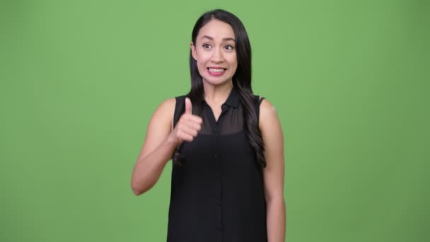 Young beautiful Asian businesswoman giving thumbs up — Stock Video