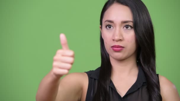 親指をあきらめて若い美しいアジア女性実業家 — ストック動画
