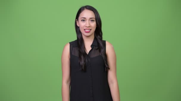 何かを示す若い美しいアジア女性実業家 — ストック動画
