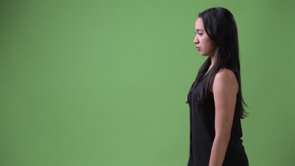 Profil över ung vacker asiatisk affärskvinna — Stockvideo