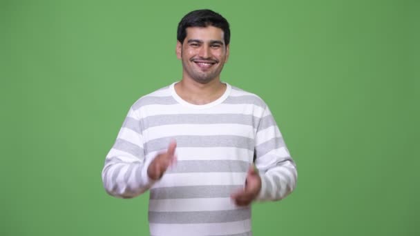 Young handsome Persian man clapping hands — Stock Video