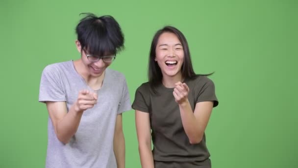 Young Asian couple laughing together — Stock Video