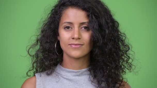 Young beautiful Hispanic woman with curly hair — Stock Video