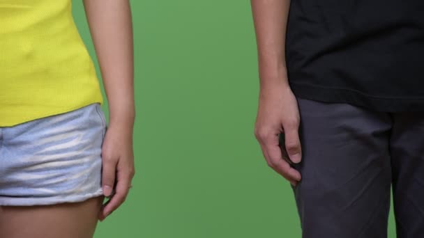 Young couple holding hands together — Stock Video