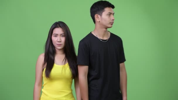 Junge glückliche asiatische Paar zusammen — Stockvideo