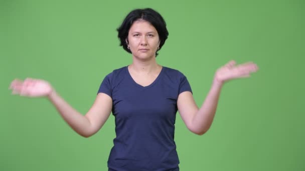 Beautiful woman covering ears as three wise monkeys concept — Stock Video