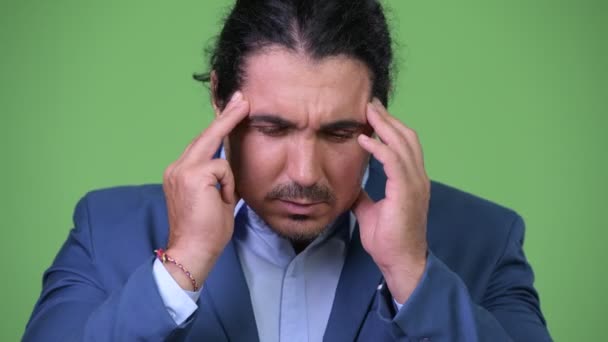 Stressed businessman having headache — Stock Video