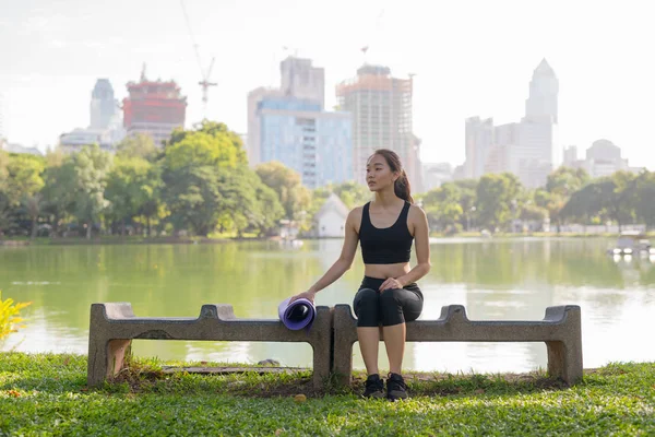 Beautiful Asian Woman Sitting In Park And Thinking — Stock Photo, Image