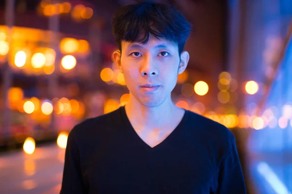 Portrait Of Asian Man Outdoors At Night — Stock Photo, Image