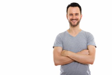 Beyaz bir arka plana dayanır yakışıklı adam portresi