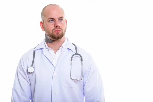 Estúdio tiro de jovem careca homem muscular médico — Fotografia de Stock