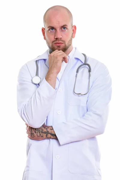 Estúdio tiro de jovem careca homem muscular médico — Fotografia de Stock