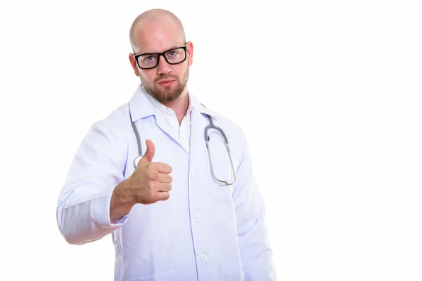 Estúdio tiro de jovem careca homem muscular médico — Fotografia de Stock