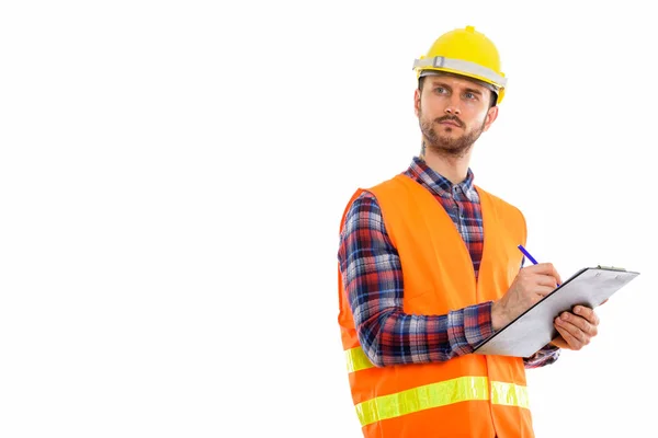 Young handsome bearded man construction worker — Stock Photo, Image