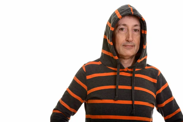 Studioaufnahme eines reifen Mannes mit Kapuzenpullover — Stockfoto