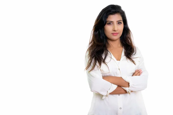 Studio shot of young beautiful Persian woman with arms crossed i — Stock Photo, Image